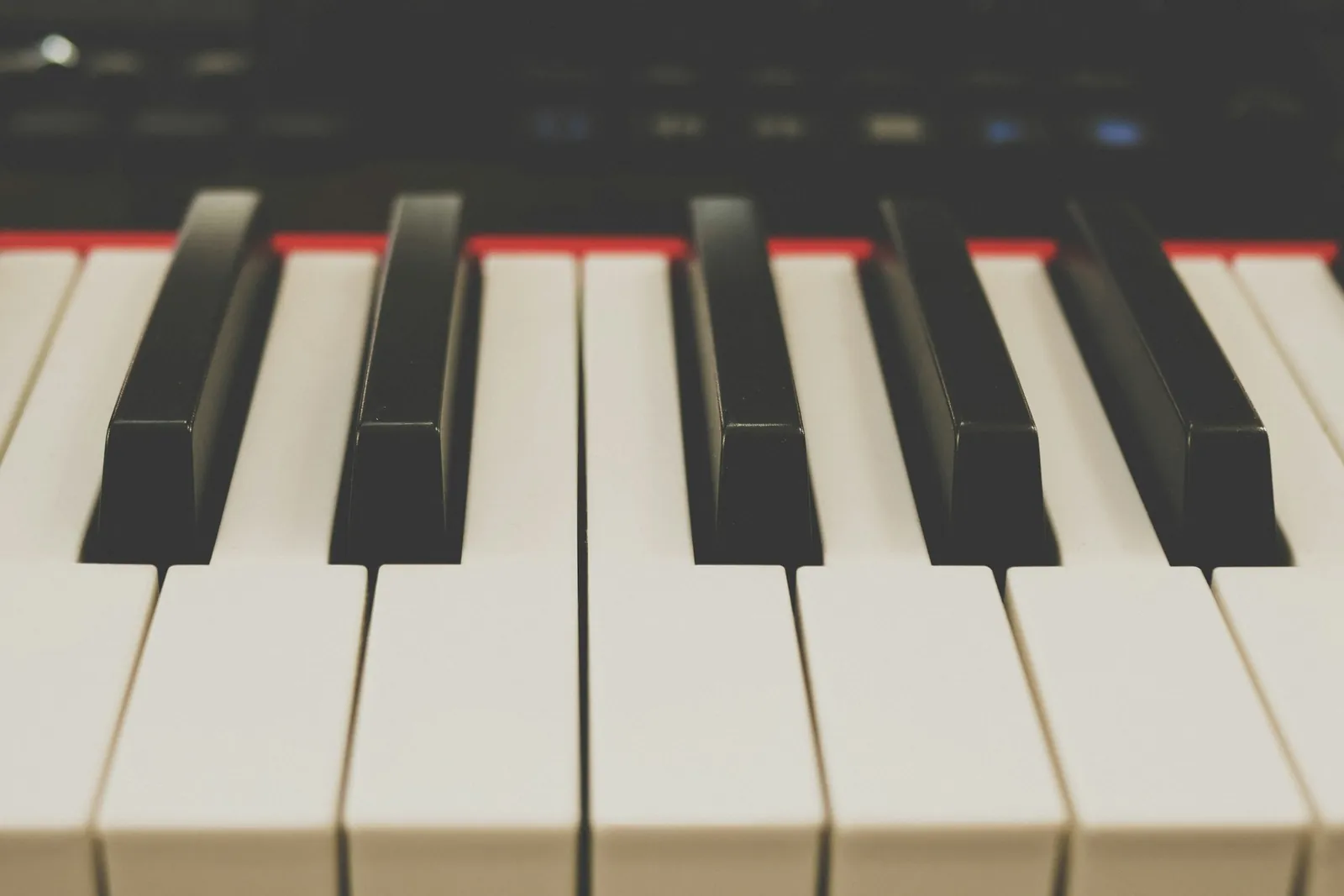 Close-up of the black and white keys of a piano