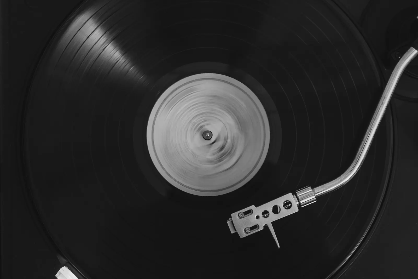A vinyl record spinning on a turntable
